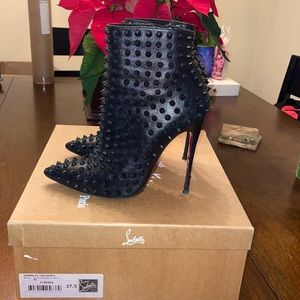 Christian Louboutin women’s black leather bootie a 37.5